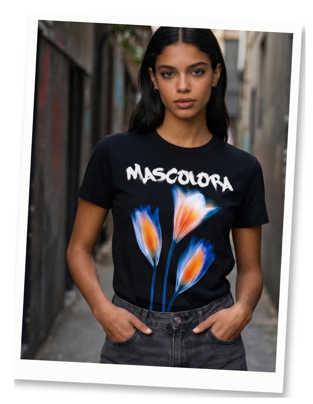 Model in an alley wearing the black MASCOLORA Bloom tee